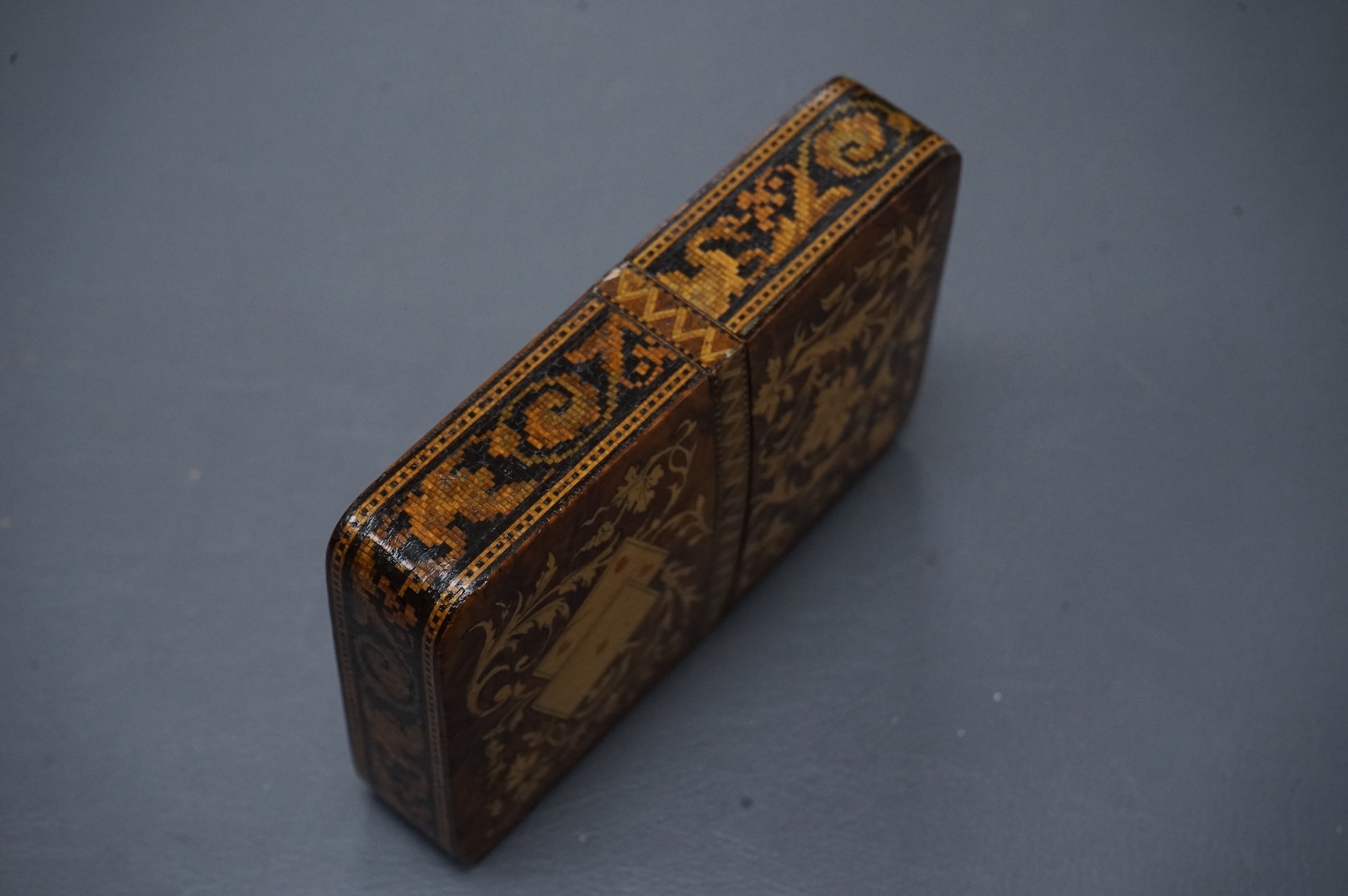 An Italian Sorrento ware playing card case, 12cm high